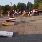 Outdoor game area, corn bag toss, basketball, pedal cars & big weel racing track, tire swings, and more for the whole gang.