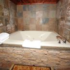 Blue Limestone Slate and stacked mountain stone found surrounding the Jacuzzi Tubs in 424, 425, 429, 430, 432, 434, 435, 436, & 437.