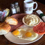 Country Ham with 2 overlight, Hot Biscuits, tomato, and of course grits.
