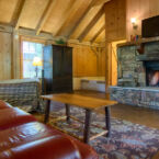 Great Room of Cabins 440 thru 444; fireplace, full kitchen, jetted garden tub.