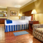 Guest Room - King bed with Sleeper Sofa and work desk.