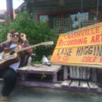 Lane Higgins, Nashville Recording Artist, in front of the Amish Hippie.